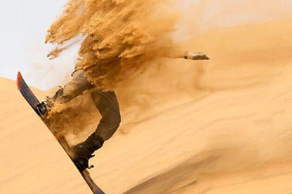 Dubai: Wüstensafari am Morgen mit Kamelritt und Sandboarding