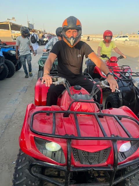 Doha: Desert Safari, Quad Bike Ride, Camel Ride, Sandboarding, and Inland Sea Visit