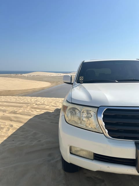 Doha: Desert Safari, Quad Bike Ride, Camel Ride, Sandboarding, and Inland Sea Visit