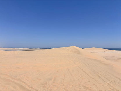 Doha: Desert Safari, Quad Bike Ride, Camel Ride, Sandboarding, and Inland Sea Visit