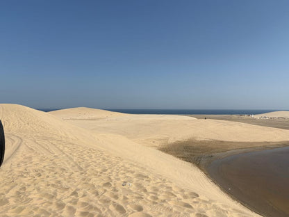 Doha: Desert Safari with ATV or Buggy Ride, Camel Ride, Sandboarding, and Inland Sea Tour