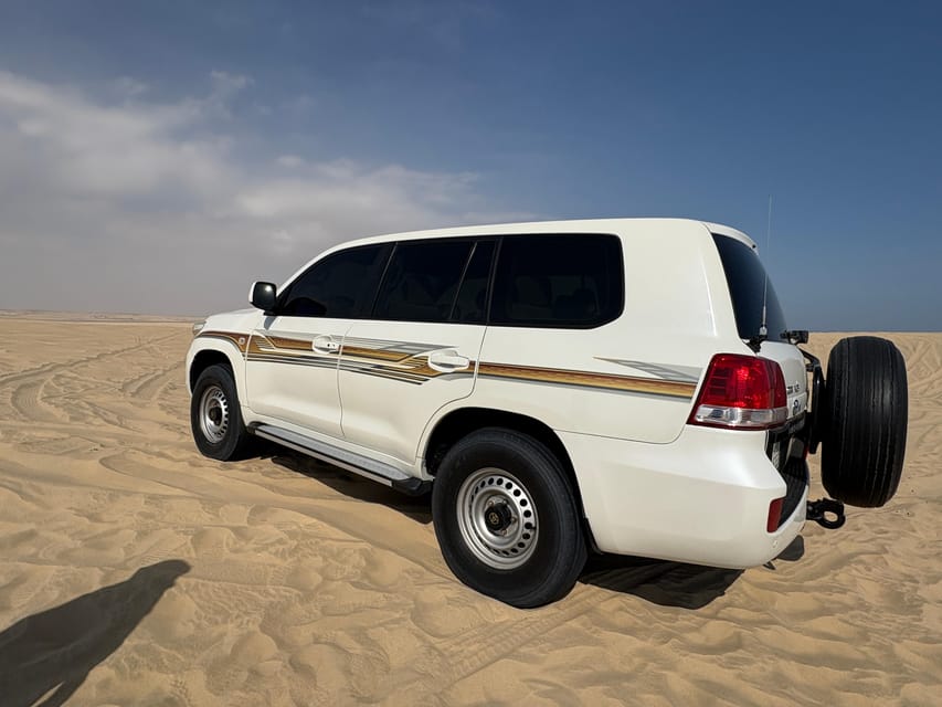 Doha: Desert Safari with ATV or Buggy Ride, Camel Ride, Sandboarding, and Inland Sea Tour