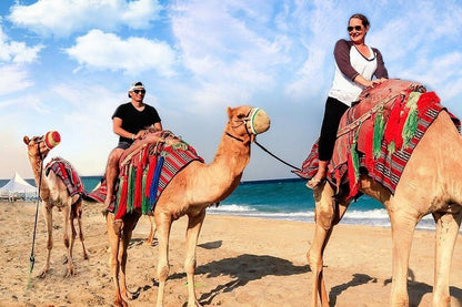 Doha: Desert Safari with Camel Ride, Sandboarding and Inland Sea Visit