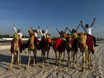 Doha: Desert Safari with Camel Ride, Sandboarding, and Inland Sea Visit