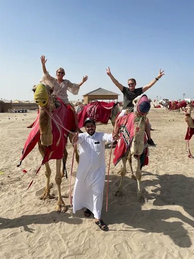 Doha: Desert Safari with Camel Ride, Sandboarding, and Inland Sea Visit