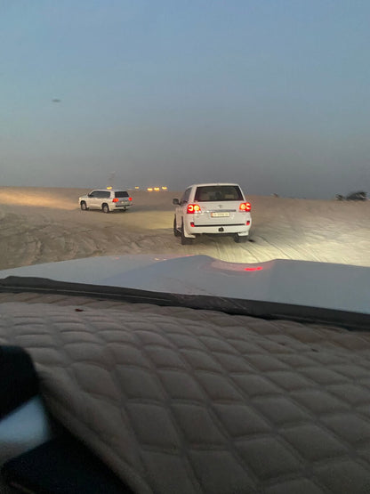 Doha: Desert Safari with Camel Ride, Sandboarding, and Inland Sea Visit