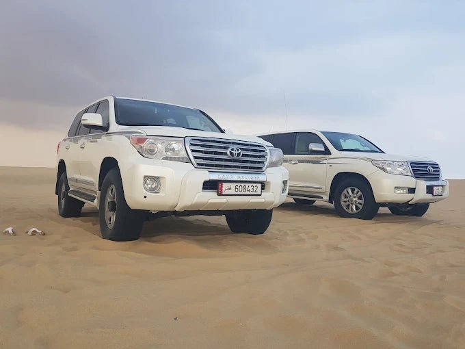 Doha: Desert Safari with Dune Bashing, Camel Ride and Sandboarding