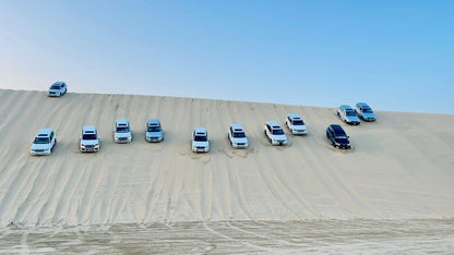 Doha: Half - Day Desert Safari Trip with Dune Bashing, Inland Sea and Sunrise or Sunset Views