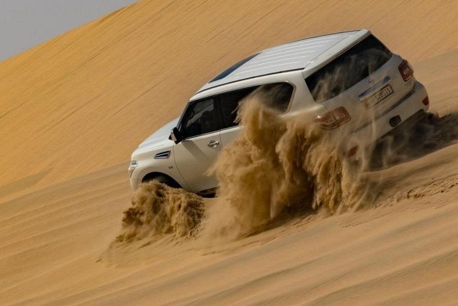 Doha: Half - Day Private Desert Safari with Camel Ride, Sandboarding and Inland Sea