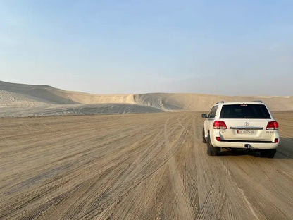 Doha: Inland Sea Desert Safari with Sandboarding and Camel Ride