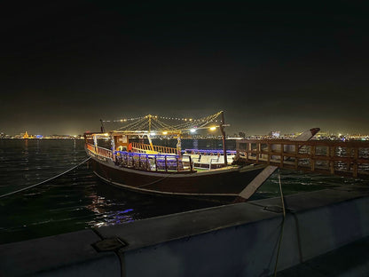 Doha: Night City Tour with Traditional Dhow Cruise