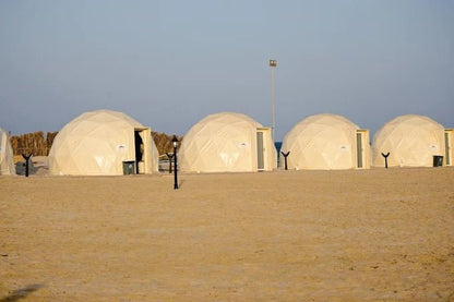 Doha: Overnight Desert Safari at Khor Al Adaid with Camel Ride and BBQ Dinner