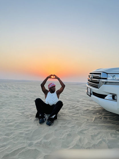 Doha: Private Desert Safari with Camel Ride, Sandboarding, and Inland Sea Visit