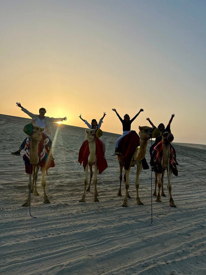 Doha: Private Desert Safari with Camel Ride, Sandboarding, and Inland Sea Visit