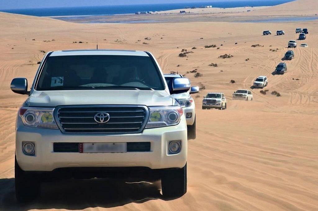 Doha: Shared Desert Safari with Dune Bashing and Sandboarding