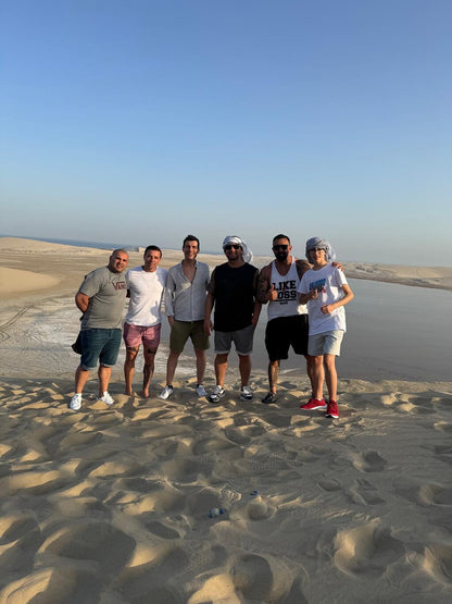 Doha: Shared Desert Safari with Dune Bashing and Sandboarding