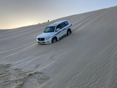 Doha: Shared Tour Half - Day Desert Safari, Sandboarding and Camel Ride