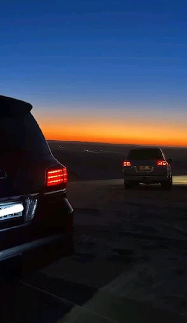 Doha: Sunrise Desert Safari with Sandboarding and Camel Ride