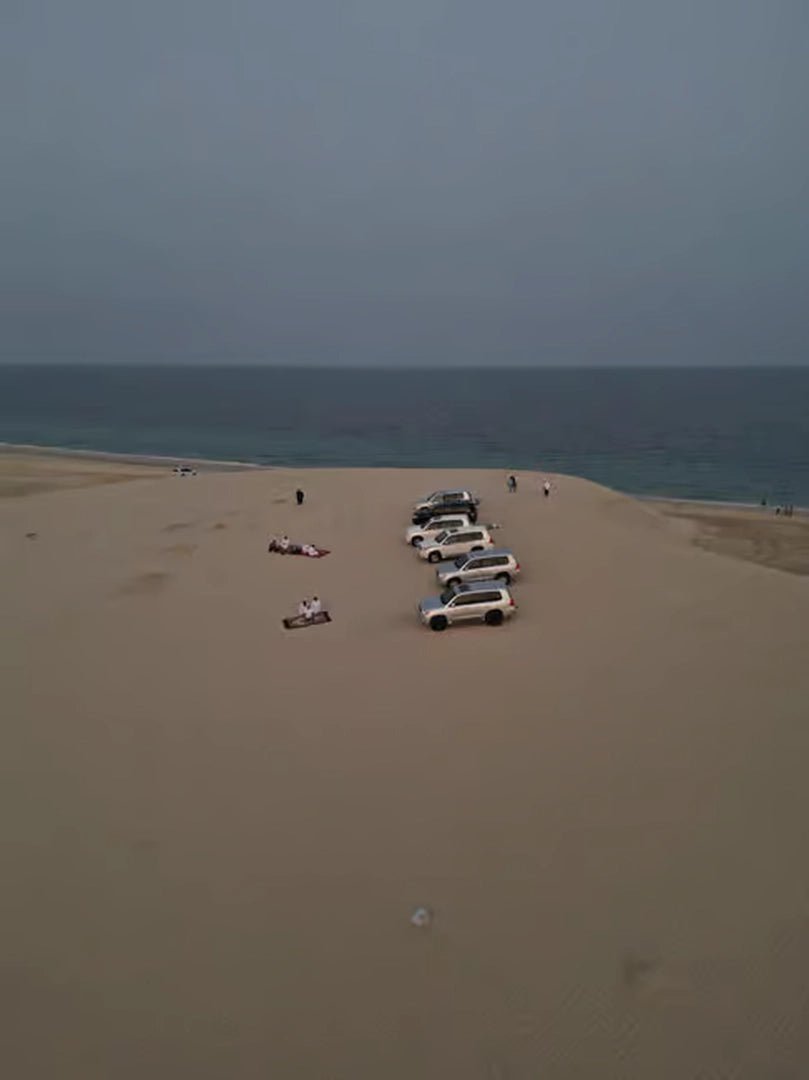 Doha: Sunrise Desert Safari with Sandboarding and Camel Ride