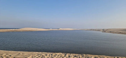 Doha: Sunrise Desert Safari with Sandboarding and Camel Ride