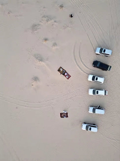 Doha: Sunrise Desert Safari with Sandboarding and Camel Ride