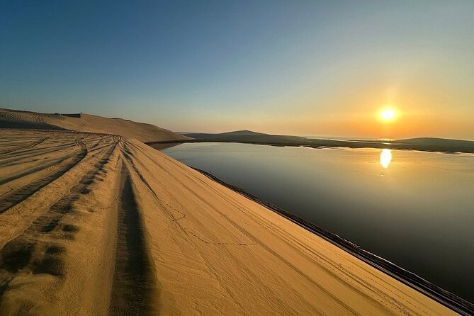 Doha: Sunrise or Sunset Desert Safari Dune Bashing, Camel Ride, and Inland Sea Views