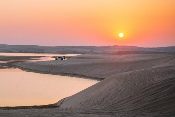 Doha: Sunrise or Sunset Desert Safari Dune Bashing, Camel Ride, and Inland Sea Views