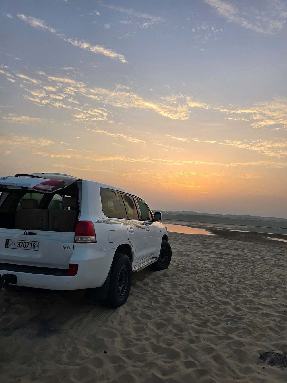 Doha: Sunrise or Sunset Desert Safari Dune Bashing, Camel Ride, and Inland Sea Views