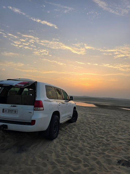 Doha: Sunrise or Sunset Desert Safari Dune Bashing, Camel Ride, and Inland Sea Views