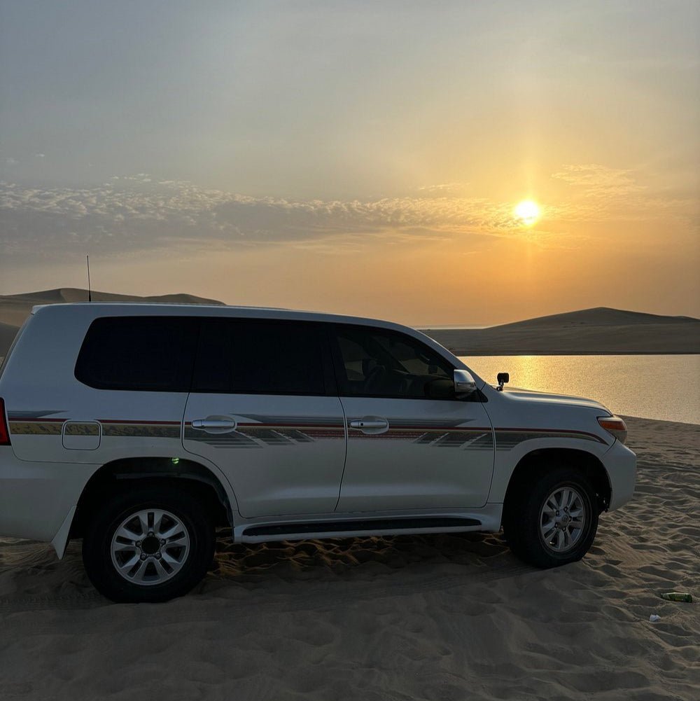 Doha: Sunrise or Sunset Desert Safari Dune Bashing, Camel Ride, and Inland Sea Views