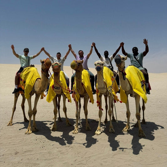 Doha: Sunrise or Sunset Desert Safari Dune Bashing, Camel Ride, and Inland Sea Views