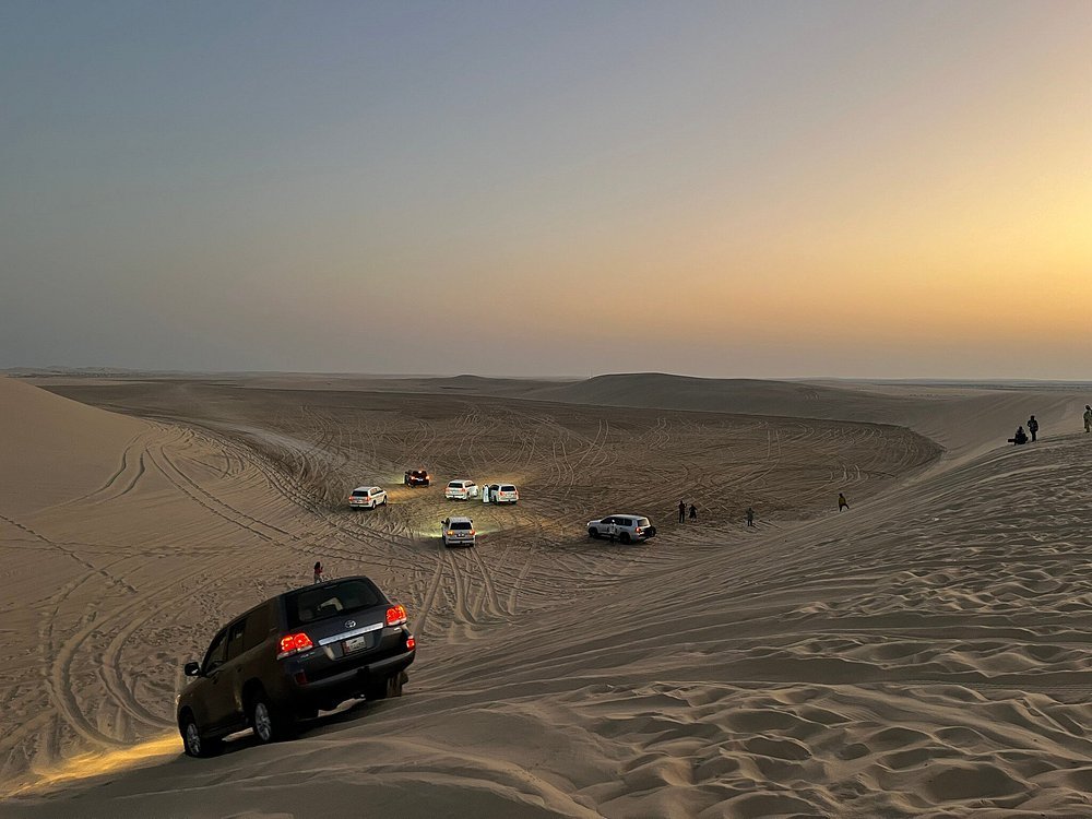 Doha: Sunrise or Sunset Desert Safari Dune Bashing, Camel Ride, and Inland Sea Views