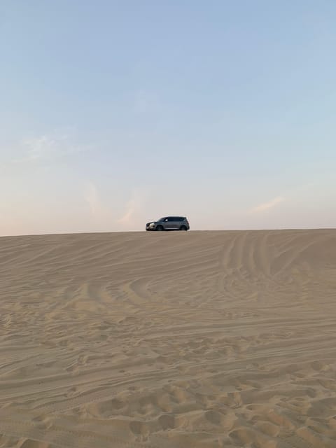 Doha: Sunrise or Sunset Desert Safari with Dune Bashing, Sandboarding and Inland Sea Trip