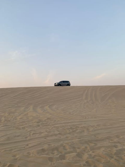 Doha: Sunrise or Sunset Desert Safari with Dune Bashing, Sandboarding and Inland Sea Trip