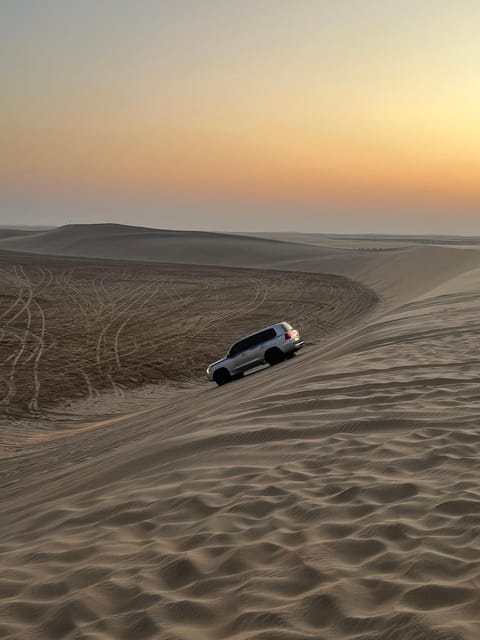 Doha: Sunrise or Sunset Desert Safari with Dune Bashing, Sandboarding and Inland Sea Trip