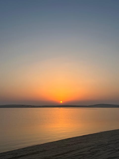 Doha: Sunrise or Sunset Desert Safari with Dune Bashing, Sandboarding and Inland Sea Trip