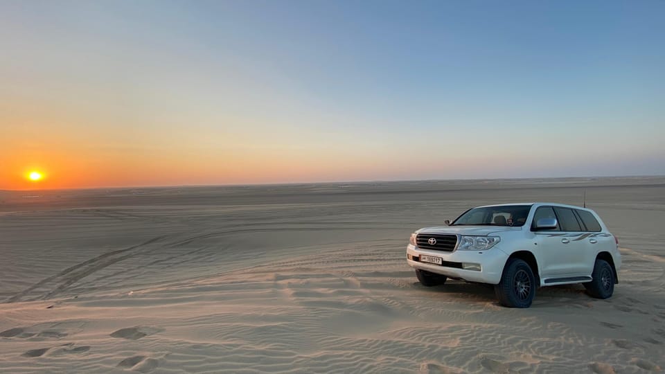 Doha: Sunrise or Sunset Desert Safari with Dune Bashing, Sandboarding and Inland Sea Trip