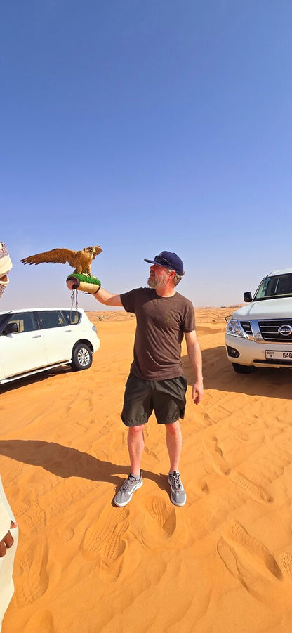Dubai: 4 - Hour Red Dune Safari with Sandboarding, Camel Ride and Hotel Pickup