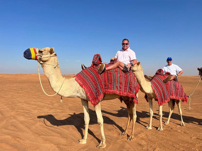 Dubai: Morning Desert Safari with Quad Bike, Sandboarding and Camel Ride