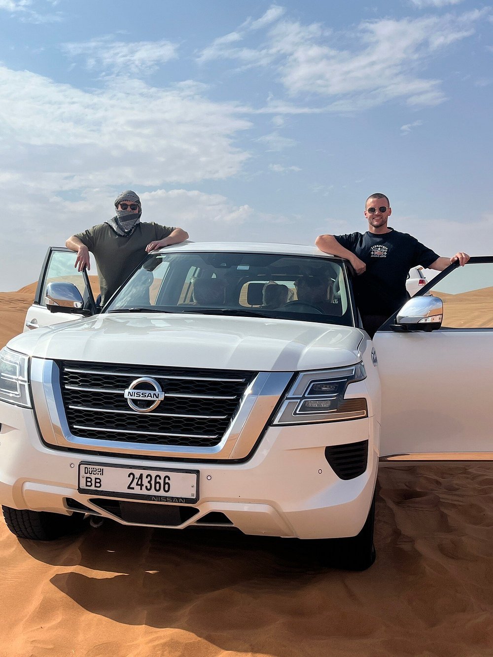 Dubai: Morning Red Dunes Safari with Camel Ride, Sandboarding and Falcon Photo