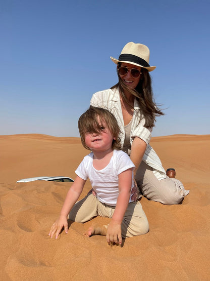 Dubai: Morning Red Dunes Safari with Camel Ride, Sandboarding and Falcon Photo