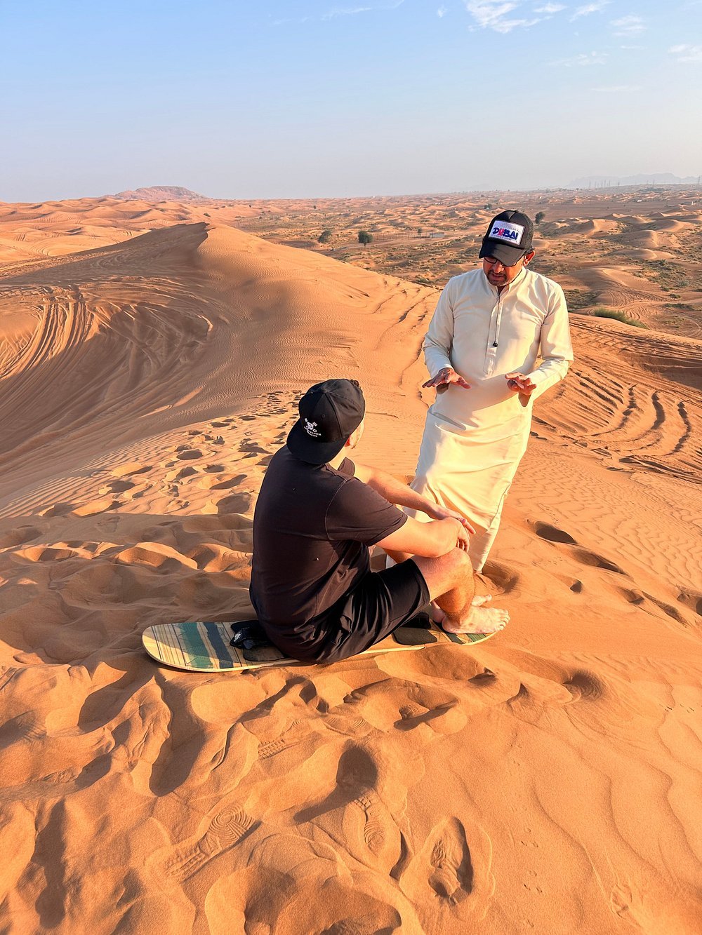 Dubai: Morning Red Dunes Safari with Camel Ride, Sandboarding and Falcon Photo