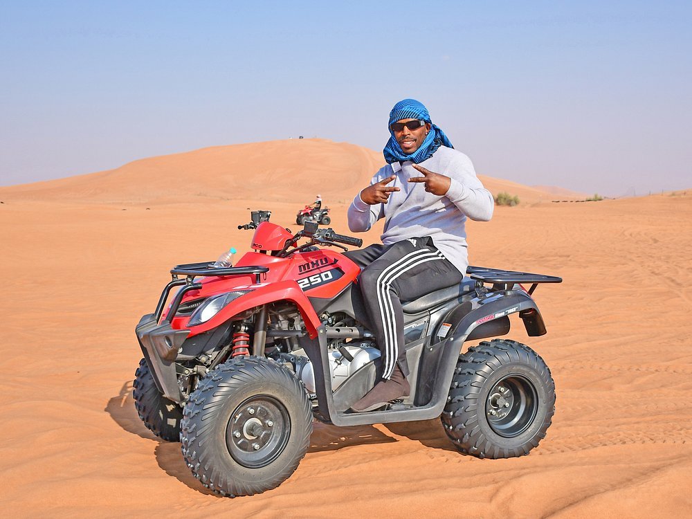 Dubai: Morning Red Dunes Safari with Camel Ride, Sandboarding and Falcon Photo