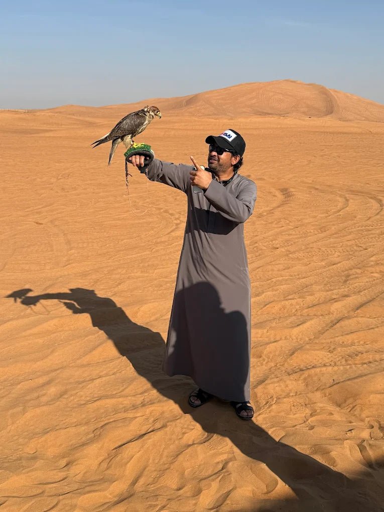 Dubai: Private Desert Safari with Camel Ride, Sandboarding and Falcon Photo