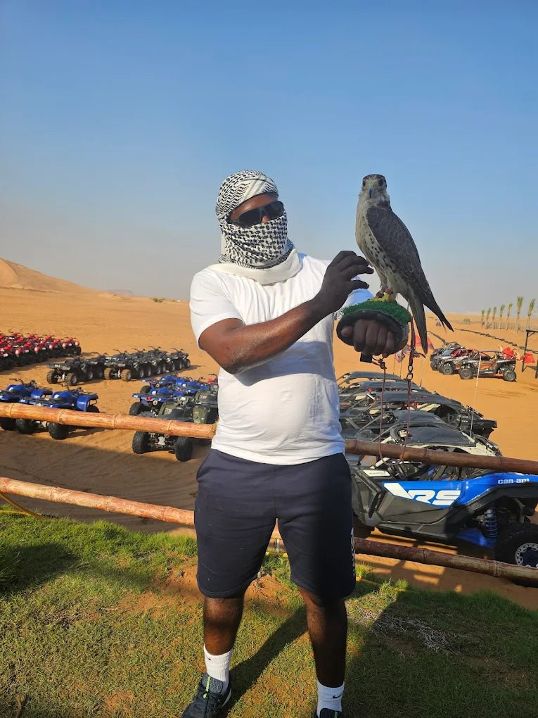 Dubai: Private Desert Safari with Camel Ride, Sandboarding and Falcon Photo