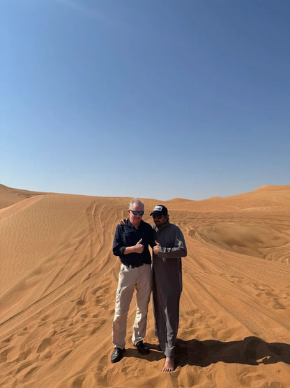 Dubai: Private Desert Safari with Camel Ride, Sandboarding and Falcon Photo