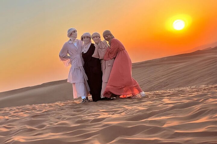 Dubai: Private Desert Safari with Camel Ride, Sandboarding and Falcon Photo