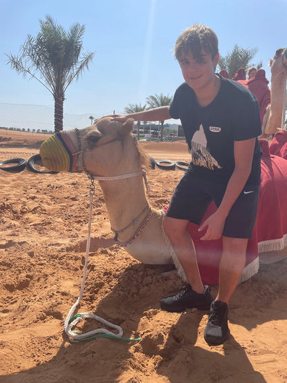 Dubai: Private Desert Safari with Camel Ride, Sandboarding and Falcon Photo