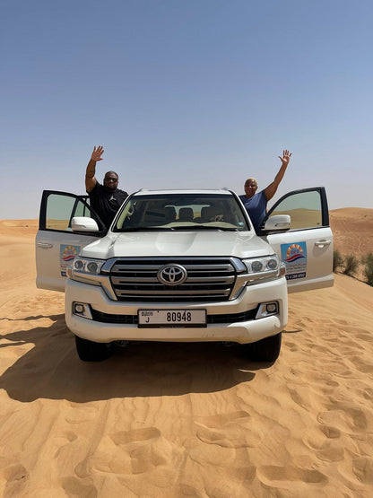 Dubai: Sunrise Desert Safari with Dune Bashing, Camel Ride and Sandboarding