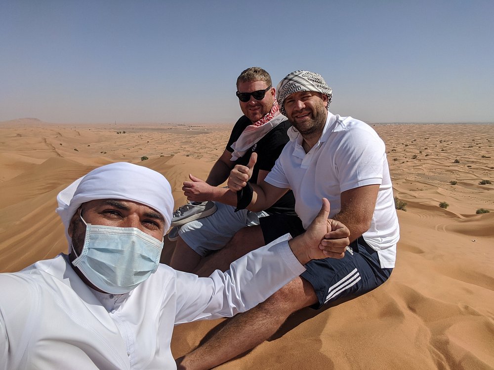 Dubai: Sunrise Desert Safari with Dune Bashing, Camel Ride and Sandboarding